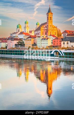 Passau, Germany. Beautiful sunset colors with old town Danube River water reflection. Stock Photo