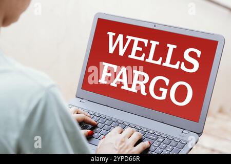 April 13, 2024, Brazil. In this photo illustration, the Wells Fargo logo is seen displayed on a laptop screen Stock Photo