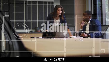 Business meeting with data analytics image over diverse professionals in office Stock Photo