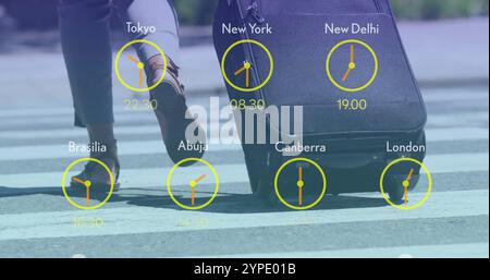 Image of clocks with time in time zones over man walking with suitcase Stock Photo