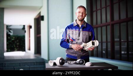 Technician Using Surveillance Security Camera Video System Stock Photo