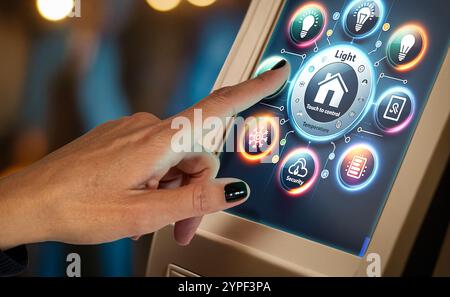 Hand Using Smart Home Control Panel Touchscreen Stock Photo
