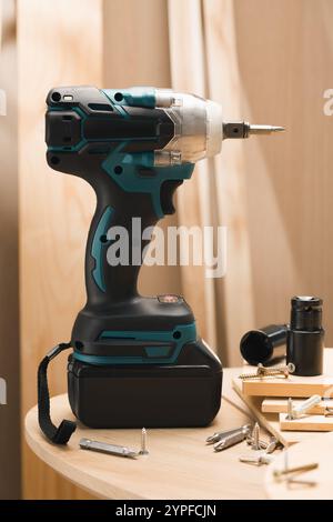 The latest Cordless Electric Drill redefines efficiency with its powerful motor, long-lasting battery, and ergonomic design, making it ideal for both Stock Photo
