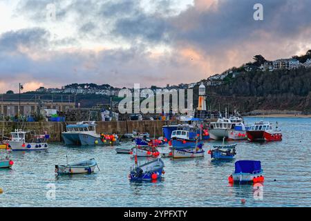 The harbour at St Ives on a autumnal day with holidaymakers crowding ...