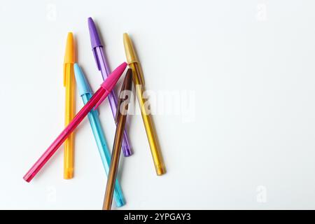 Bunch of colorful pens isolated on white background. Creativity concept for school, art class and drawing lesson. Stock Photo