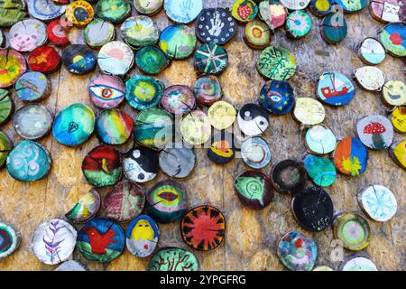 Decorative wooden plates are assembled on the wall Stock Photo