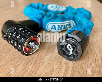 A broken bike combination lock by the German manufacturer Abus on a table Stock Photo