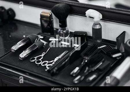 Tools and equipment arranged neatly on a barbers workstation for grooming tasks Stock Photo