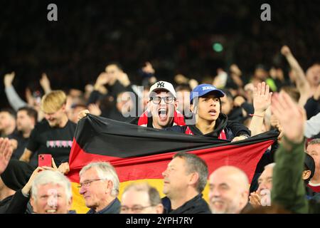 London Stadium, London, UK. 30th Nov, 2024. Premier League Football, West Ham United versus Arsenal; Arsenal fans wave bye to early leaving West Ham United fans in the 36th minute at a score of 0-4. Credit: Action Plus Sports/Alamy Live News Stock Photo