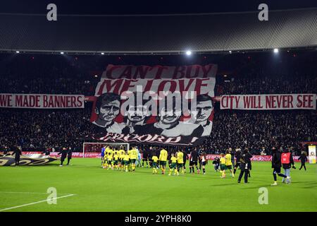 ROTTERDAM - (l-r) Banner Can't buy me love during the Dutch Eredivisie match between Feyenoord and Fortuna Sittard at Feyenoord Stadium de Kuip on Nov. 30, 2024 in Rotterdam, Netherlands. ANP OLAF KRAAK Stock Photo