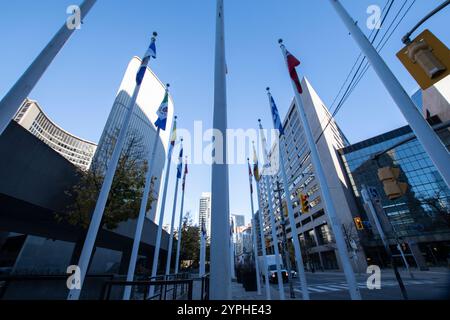 Flags at Nathan Phillips Square on Bay Street in downtown Toronto, Ontario, Canada Stock Photo