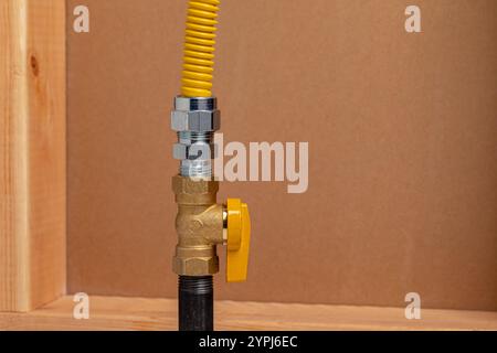 Natural gas or propane shutoff valve. Plumbing, home maintenance, repair and remodeling concept. Stock Photo