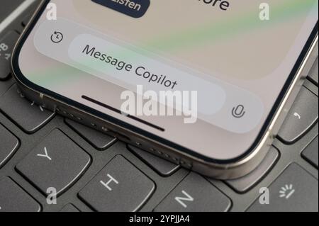 New York, USA - November 26, 2024: Copilot AI menu with text bar on screen in keyboard button background close up view Stock Photo