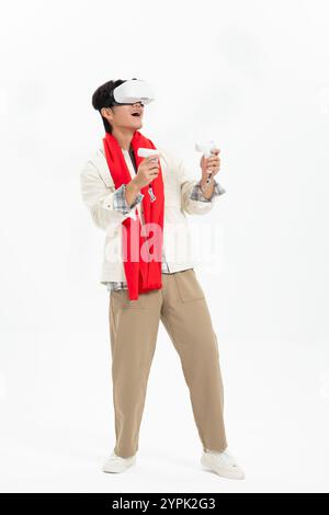 Young Asian man wearing VR game on his head Stock Photo