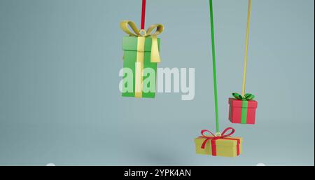 Colorful gift boxes hang suspended against a plain background Stock Photo