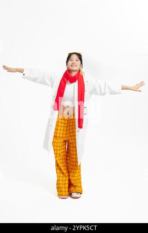 woman wearing a windbreaker and headphones Stock Photo