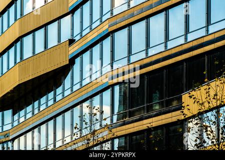 Abstract Reflection of Light and Shadows on Modern Glass Facade with Geometric Patterns Stock Photo