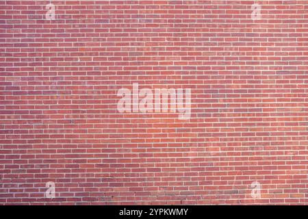Background from a large wall made of red bricks Stock Photo