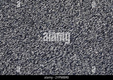 Black and White Machine Knitted Texture Background – High-Resolution Textile Design. Stock Photo