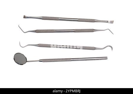Dentist Tools on Clean White Background – Professional Dental Instruments Stock Image. Stock Photo