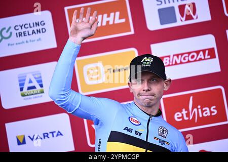 Belgian Aaron Dockx celebrates on the podium after winning the men U23 ...