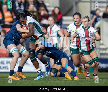 1st December 2024; Salford Community Stadium, Salford, Lancashire, England; Allianz Premiership Womens Rugby, Sale Sharks versus Leicester Tigers; Julia Omokhuale of Leicester Tigers Women is tackled Stock Photo