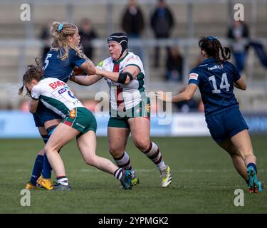 1st December 2024; Salford Community Stadium, Salford, Lancashire, England; Allianz Premiership Womens Rugby, Sale Sharks versus Leicester Tigers; Erica Jarrell of Sale Sharks Women is tackled Stock Photo