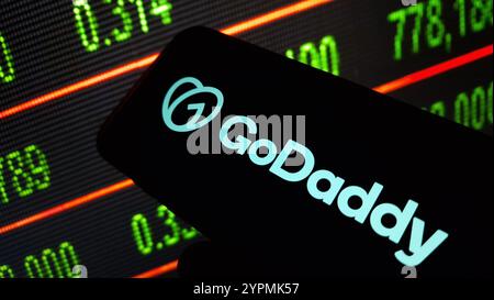 Konskie, Poland - November 30, 2024: GoDaddy Inc company logo displayed on mobile phone Stock Photo