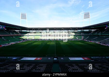 30.11.2024, wohninvest Weserstadion, Bremen, GER, 1.FBL SV Werder Bremen vs.VfB Stuttgart im Bild/picture shows Feature/Impressionen Weserstadion mit Flutlichtmasten Foto © nordphoto GmbH/Tauchnitz DFB REGULATIONS PROHIBIT ANY USE OF PHOTOGRAPHS AS IMAGE SEQUENCES AND/OR QUASI-VIDEO. Stock Photo