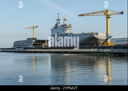 Saint-Nazaire, France. Nov 30,2024: As the war in Ukraine escalates ahead of potential negotiations & a race for new military technologies, flashback to a forgotten event. 10 years ago, in last days of November 2014, French President François Hollande refused to honor the contract for the delivery of two helicopter carriers (BPC Mistral class) to Russia, in the wake of the invasion of Crimea. At the same time, sensitive IT equipment was stolen from one of the two ships under construction: the amphibious warships LHD Vladivostok and Sebastopol (Landing Helicopter Dock). Credit: KEVIN IZORCE/Ala Stock Photo