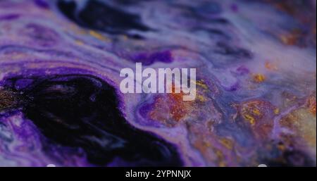 Glitter paint blend. Marble texture. Defocused multicolor purple shimmering fluid sparkling flow bright particles moving on abstract art background. Stock Photo