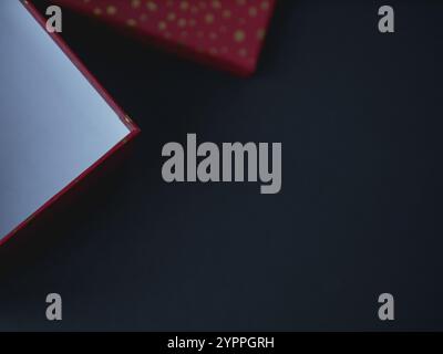 Flat lay Christmas and New Year gift boxe, top view on dark background.Copy space for text Stock Photo