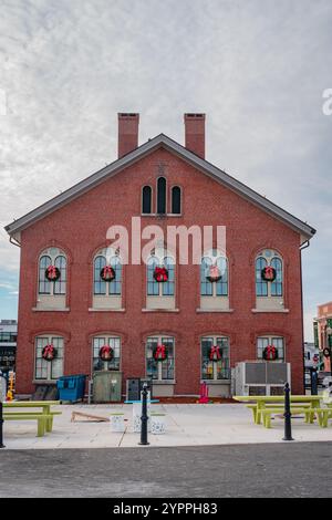 Andover, MA, US-November 27, 2024:  Andover's historic Old Town Hall building on Main Street with public art. Stock Photo