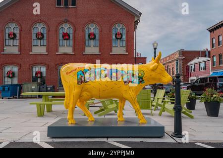 Andover, MA, US-November 27, 2024:  Andover's historic Old Town Hall building on Main Street with public art. Stock Photo