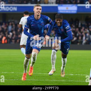 London, UK. 01st Dec, 2024. Chelsea v Aston Villa - Premier League - Stamford Bridge.                                                                                    Cole Palmer celebrates scoring Chelsea's 3rd goal with Noni Madueke. Picture Credit: Mark Pain / Alamy Live News Stock Photo