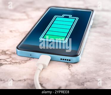 Smartphone connected with usb and charging battery. Stock Photo