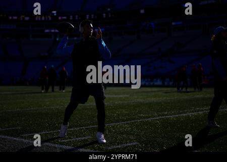 Charlotte, NC, USA. 1st Dec, 2024. Carolina Panthers quarterback Bryce Young (9) warms up before the NFL matchup in Charlotte, NC. (Scott Kinser/CSM). Credit: csm/Alamy Live News Stock Photo