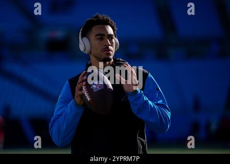 Charlotte, NC, USA. 1st Dec, 2024. Carolina Panthers quarterback Bryce Young (9) warms up before the NFL matchup in Charlotte, NC. (Scott Kinser/CSM). Credit: csm/Alamy Live News Stock Photo