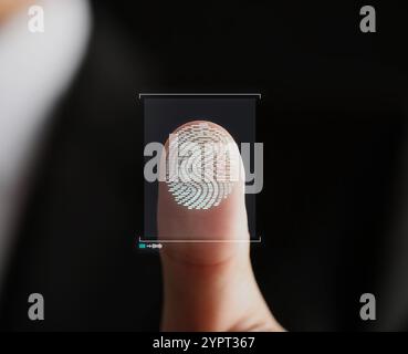 Man pressing finger to surface showing friction ridges pattern, closeup. Scanning fingerprint Stock Photo