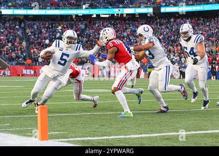 Foxborough, MA, USA. 1st Dec, 2024. MA, USA; Indianapolis Colts quarterback Anthony Richardson (5) runs with the ball during the NFL game between Indianapolis Colts and New England Patriots in Foxborough, MA. Anthony Nesmith/CSM/Alamy Live News Stock Photo