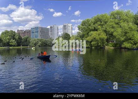 Moscow, Russia, July 31, 2021: People ride spoons on the pond in the historic estate, Europe Stock Photo