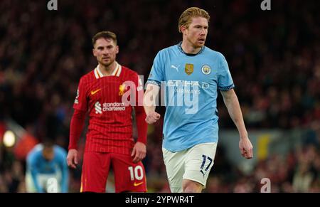 Anfield, Liverpool on Sunday 1st December 2024. Manchester City's Kevin De Bruyne is seen with Liverpool's Alexis Mac Allister during the Premier League match between Liverpool and Manchester City at Anfield, Liverpool on Sunday 1st December 2024. (Photo: Steven Halliwell | MI News) Credit: MI News & Sport /Alamy Live News Stock Photo