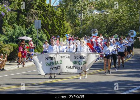 Poway High School Marching Band, 4th July Independence Day Parade at Rancho Bernardo, San Diego, California, USA. Young student parading with flags an Stock Photo