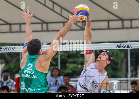 Laguna Province. 1st Dec, 2024. Timo Hammarberg (R) of Austria competes against Joaquin Bello of England during the Men's 3rd place match between Javier Bello/Joaquin Bello of England and Philipp Waller/Timo Hammarberg of Germany at the 2024 Volleyball World Beach Pro Tour Challenge in Laguna Province, the Philippines on Dec. 1, 2024. Credit: Rouelle Umali/Xinhua/Alamy Live News Stock Photo