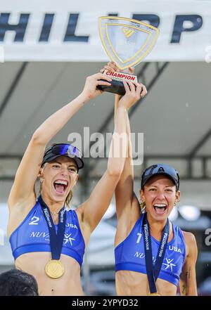 Laguna Province. 1st Dec, 2024. Gold medalists Molly Shaw(R)/Toni Rodriguez of the United States celebrate during the awarding ceremony after the women's final against Noa Sonneville/Brecht Piersma of the Netherlands at the 2024 Volleyball World Beach Pro Tour Challenge in Laguna Province, the Philippines on Dec. 1, 2024. Credit: Rouelle Umali/Xinhua/Alamy Live News Stock Photo