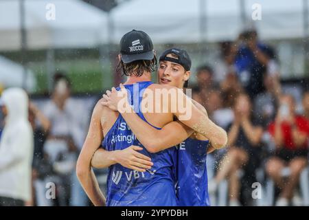 Laguna Province. 1st Dec, 2024. Jacob Holting Nilsson/Elmer Andersson (back) of Sweden celebrate after winning the Men's final between Jacob Holting Nilsson/Elmer Andersson of Sweden and Paul Henning/Tamo Wust of Germany at the 2024 Volleyball World Beach Pro Tour Challenge in Laguna Province, the Philippines on Dec. 1, 2024. Credit: Rouelle Umali/Xinhua/Alamy Live News Stock Photo