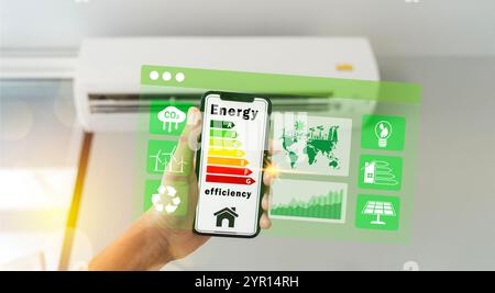 Energy efficiency concept. energy efficient house building rate label audit for sustainable development. Person use smartphone with energy efficiency Stock Photo