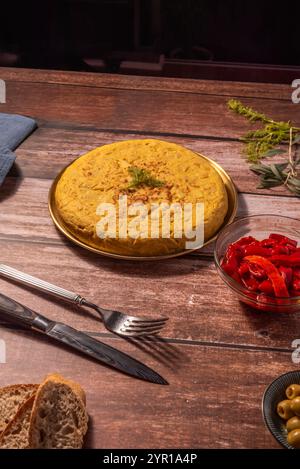 Pour the mixture into a hot pan and cook over medium heat, turning the tortilla once or twice so it cooks evenly Stock Photo