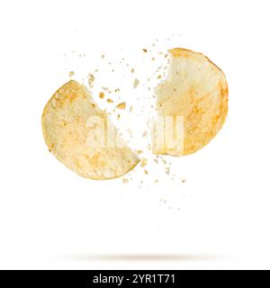 Broken potato chip with crumbs falling, isolated on white background. Stock Photo