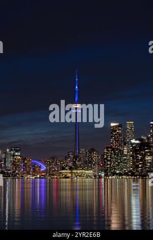 Toronto CN Tower illuminated at night Stock Photo - Alamy